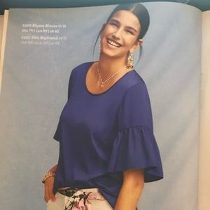 CAbi Rhyme Blouse in Royal Blue. Flared sleeves, goes well with white pants.